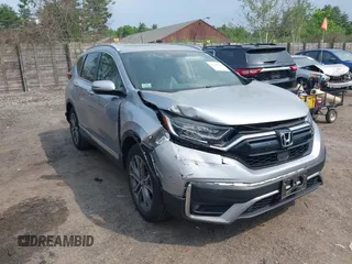 2022 Honda CR-V Touring z VIN 2HKRW2H9XNH666782, wystawiony jako IAAI lot #42437634 z przebiegiem 39 975 mil mil oraz . Historia ofert i sprzedaży dostępna na DreamBid. Obrazek 1.