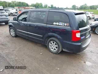 2011 Chrysler Town & Country Touring with VIN 2A4RR5DG7BR641411, listed as a IAAI auction lot 42090973 with 158,298 mi miles and . Bid and sale history available at DreamBid. Image 3.