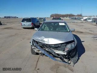 2011 Ford Fusion Hybrid with VIN 3FADP0L38BR302907, listed as a IAAI auction lot 41805491 with 197,453 mi miles. Bid and sale history available at carsss.com. Image 6.