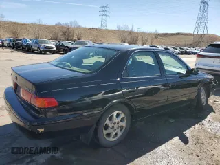 2000 Toyota Camry CE z VIN 4T1BG22K0YU699662, wystawiony jako Copart lot #47949165 z przebiegiem 270 179 mil mil oraz Szkoda całkowita • Salvage title. Historia ofert i sprzedaży dostępna na DreamBid. Obrazek 3.