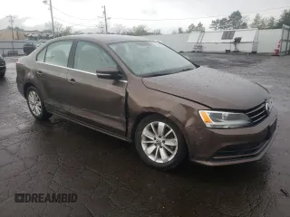 2015 Volkswagen Jetta SE z VIN 3VWD17AJ1FM422960, wystawiony jako Copart lot #55860335 z przebiegiem 87 616 mil mil oraz Czysty tytuł • Clean title. Historia ofert i sprzedaży dostępna na DreamBid. Obrazek 4.