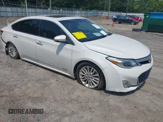 2014 Toyota Avalon Limited z VIN 4T1BD1EB9EU027285, wystawiony jako IAAI lot #42392687 z przebiegiem 147 553 mil mil oraz . Historia ofert i sprzedaży dostępna na DreamBid. Obrazek 1.