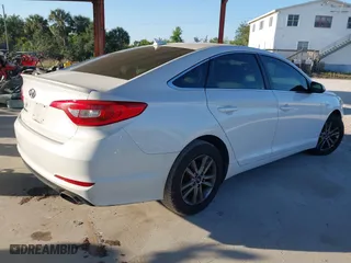2015 Hyundai Sonata 2.4L SE with VIN 5NPE24AF5FH122097, listed as a IAAI auction lot 42065663 with 218,586 mi miles. Bid and sale history available at carsss.com. Image 4.