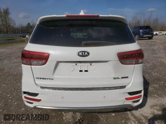 2016 Kia Sorento SXL z VIN 5XYPKDA16GG102852, wystawiony jako Copart lot #75659454 z przebiegiem Nie podano mil oraz Nie do naprawy • Non repairable. Historia ofert i sprzedaży dostępna na DreamBid. Obrazek 6.