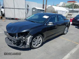 2014 Lincoln MKZ Hybrid z VIN 3LN6L2LU2ER830378, wystawiony jako IAAI lot #42207921 z przebiegiem 155 304 mil mil oraz . Historia ofert i sprzedaży dostępna na DreamBid. Obrazek 2.