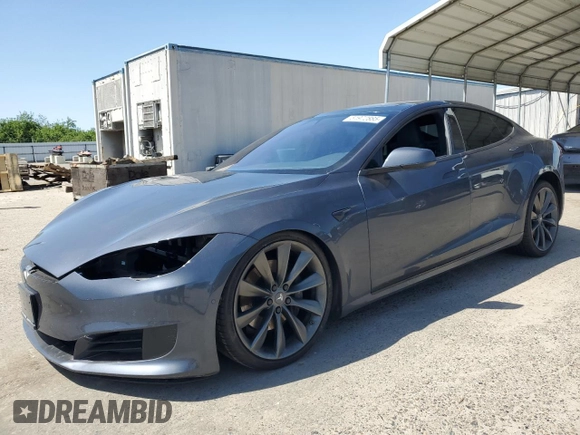 2016 Tesla Model S 90D with VIN 5YJSA1E22GF177120, listed as a Copart auction lot 51972885 with 73,441 mi miles and Salvage title. Bid and sale history available at DreamBid. Image 1.