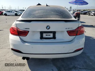 2019 BMW 4 Series 430i xDrive z VIN WBA4J3C56KBL05093, wystawiony jako Copart lot #52215335 z przebiegiem 55 900 mil mil oraz Szkoda całkowita • Salvage title. Historia ofert i sprzedaży dostępna na DreamBid. Obrazek 6.