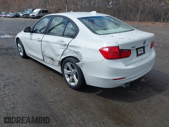 2013 BMW 3 Series 328i xDrive with VIN WBA3B5G5XDNS04574, listed as a IAAI auction lot 41935635 with 135,408 mi miles. Bid and sale history available at carsss.com. Image 3.