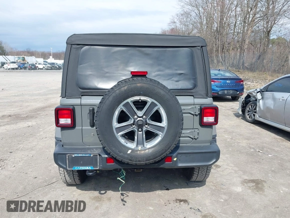 2018 Jeep Wrangler Unlimited Sahara z VIN 1C4HJXEN8JW329816, wystawiony jako IAAI lot #42055851 z przebiegiem 70 298 mil mil oraz . Historia ofert i sprzedaży dostępna na DreamBid. Obrazek 16.