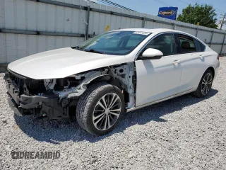 2018 Buick Regal Essence with VIN W04GP6SXXJ1093574, listed as a Copart auction lot 62387425 with 27,879 mi miles and Salvage title. Bid and sale history available at DreamBid. Image 1.