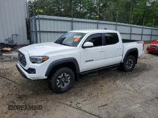 2023 Toyota Tacoma SR z VIN 3TMCZ5AN8PM561029, wystawiony jako Copart lot #54339545 z przebiegiem 29 902 mil mil oraz Szkoda całkowita • Salvage title. Historia ofert i sprzedaży dostępna na DreamBid. Obrazek 1.