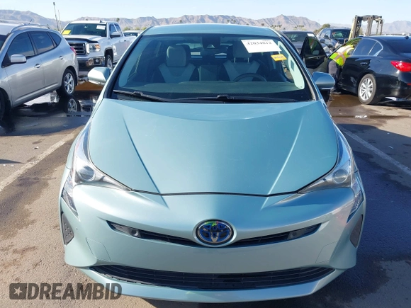 2018 Toyota Prius Two with VIN JTDKBRFUXJ3066430, listed as a IAAI auction lot 42034812 with 119,711 mi miles and . Bid and sale history available at carsss.com. Image 12.