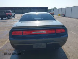 2014 Dodge Challenger R/T с VIN 2C3CDYBT8EH274089, выставлен на аукционе IAAI как лот 42392332 с пробегом 150 254 миль миль и . История ставок и продаж доступна на DreamBid. Изображение 17.