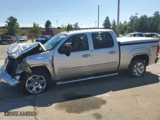 2013 GMC Sierra 1500 SLT with VIN 3GTP2WE70DG210472, listed as a Copart auction lot 70811604 with 111,002 mi miles and Salvage Title. Bid and sale history available at carsss.com. Image 1.
