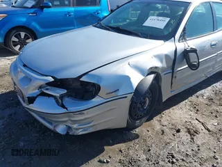 2003 Pontiac Grand Am GT with VIN 1G2NW52E13M612218, listed as a IAAI auction lot 41478495 with 242,179 mi miles. Bid and sale history available at carsss.com. Image 6.