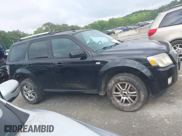 2009 Mercury Mariner Premier with VIN 4M2CU97749KJ15320, listed as a IAAI auction lot 42450753 with 182,172 mi miles and . Bid and sale history available at DreamBid. Image 13.