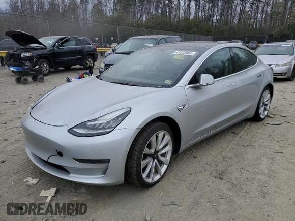 2018 Tesla Model 3 Long Range Battery with VIN 5YJ3E1EA8JF060682, listed as a Copart auction lot 47072985 with Not Provided miles and Salvage Title. Bid and sale history available at DreamBid. Image 1.
