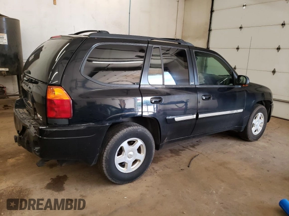 2003 GMC Envoy SLT with VIN 1GKDT13S732208692, listed as a Copart auction lot 67475514 with 243,146 mi miles and Salvage Title. Bid and sale history available at carsss.com. Image 3.