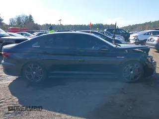2019 Volkswagen Jetta GLI S z VIN 3VW5T7BU1KM156888, wystawiony jako IAAI lot #40778065 z przebiegiem 97 114 mil mil oraz . Historia ofert i sprzedaży dostępna na DreamBid. Obrazek 13.