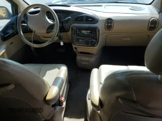1998 Chrysler Town & Country LXi with VIN 1C4GP64L2WB637437, listed as a Copart auction lot 70504424 with 82,972 mi miles and Salvage Title. Bid and sale history available at carsss.com. Image 8.