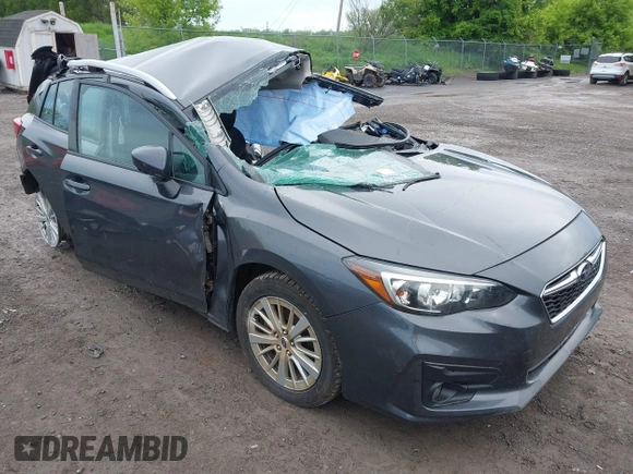 2018 Subaru Impreza Premium z VIN 4S3GTAD67J3701533, wystawiony jako IAAI lot #42157704 z przebiegiem 63 999 mil mil oraz . Historia ofert i sprzedaży dostępna na DreamBid. Obrazek 1.