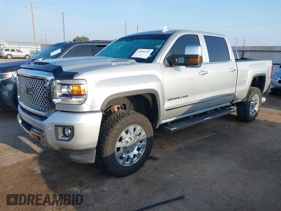 2017 GMC Sierra 2500HD Denali with VIN 1GT12UEY2HF192132, listed as a IAAI auction lot 42094570 with 119,361 mi miles and . Bid and sale history available at DreamBid. Image 2.