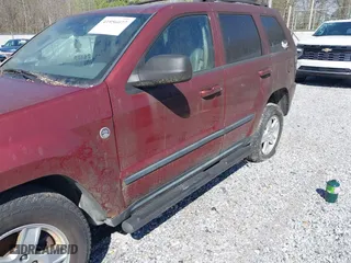 2007 Jeep Grand Cherokee Laredo with VIN 1J8HR48P07C694448, listed as a IAAI auction lot 41956077 with 232,366 mi miles. Bid and sale history available at carsss.com. Image 6.