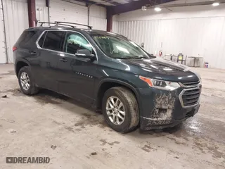 2019 Chevrolet Traverse LT Cloth with VIN 1GNEVGKW2KJ213750, listed as a IAAI auction lot 41214664 with 166,233 mi miles. Bid and sale history available at carsss.com. Image 1.