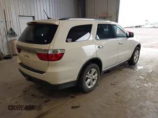 2012 Dodge Durango SXT with VIN 1C4RDJAGXCC295138, listed as a IAAI auction lot 42333094 with 96,581 mi miles and . Bid and sale history available at DreamBid. Image 4.