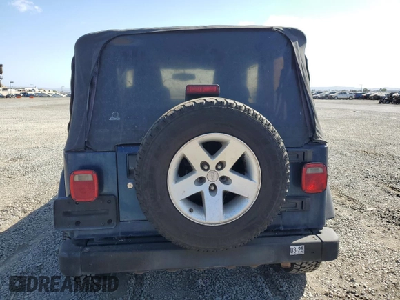 2005 Jeep Wrangler Rubicon with VIN 1J4FA69S05P351725, listed as a Copart auction lot 71411904 with 144,557 mi miles and Salvage Title. Bid and sale history available at carsss.com. Image 6.