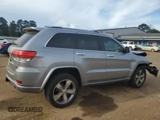 2016 Jeep Grand Cherokee Overland with VIN 1C4RJFCT2GC320247, listed as a Copart auction lot 50832195 with 104,300 mi miles and Salvage title. Bid and sale history available at DreamBid. Image 3.