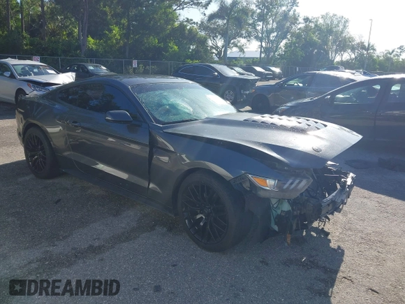 2017 Ford Mustang EcoBoost z VIN 1FA6P8TH5H5287023, wystawiony jako IAAI lot #42600833 z przebiegiem 103 685 mil mil oraz . Historia ofert i sprzedaży dostępna na DreamBid. Obrazek 1.