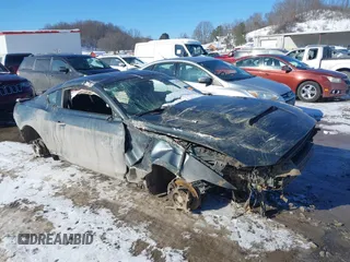 2016 Ford Mustang V6 z VIN 1FA6P8AM1G5205447, wystawiony jako IAAI lot #41284689 z przebiegiem 160 705 mil mil oraz . Historia ofert i sprzedaży dostępna na DreamBid. Obrazek 1.