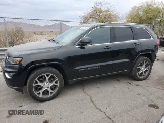 2018 Jeep Grand Cherokee Limited with VIN 1C4RJFBT9JC143771, listed as a Copart auction lot 85987184 with 55,549 mi miles and Salvage title. Bid and sale history available at DreamBid. Image 1.