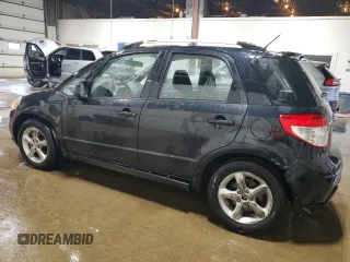 2009 Suzuki SX4 Touring AWD with VIN JS2YB417496202243, listed as a Copart auction lot 53842055 with 70,544 mi miles and Salvage Title. Bid and sale history available at DreamBid. Image 2.