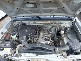 2000 Nissan Frontier XE z VIN 1N6DD26S9YC305451, wystawiony jako IAAI lot #41928123 z przebiegiem Nie podano mil oraz . Historia ofert i sprzedaży dostępna na DreamBid. Obrazek 10.