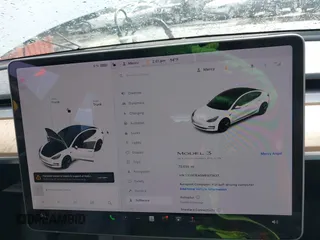 2021 Tesla Model 3 Standard Range Plus z VIN 5YJ3E1EA5MF977437, wystawiony jako IAAI lot #40297512 z przebiegiem 72 039 mil mil oraz . Historia ofert i sprzedaży dostępna na DreamBid. Obrazek 7.