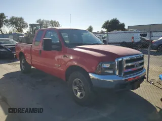 2004 Ford F-250 XL with VIN 1FTNX20P04EB98825, listed as a Copart auction lot 79729074 with 176,099 mi miles and Salvage title. Bid and sale history available at DreamBid. Image 4.