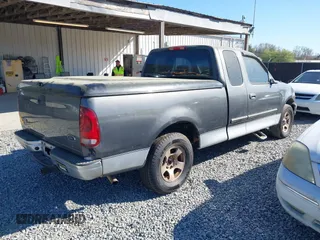 2002 Ford F-150 XL with VIN 1FTRX17W72NB13467, listed as a IAAI auction lot 41829169 with 1 mi miles. Bid and sale history available at carsss.com. Image 4.