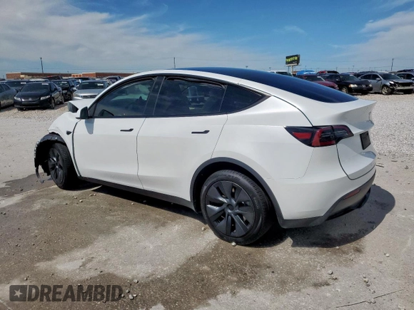 2024 Tesla Model Y Long Range z VIN 7SAYGDEE0RA313929, wystawiony jako Copart lot #59548725 z przebiegiem Nie podano mil oraz Szkoda całkowita • Salvage title. Historia ofert i sprzedaży dostępna na DreamBid. Obrazek 2.