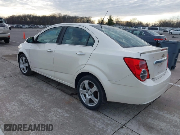 2014 Chevrolet Sonic LTZ with VIN 1G1JE5SH3E4133088, listed as a IAAI auction lot 41072056 with 143,855 mi miles. Bid and sale history available at carsss.com. Image 3.