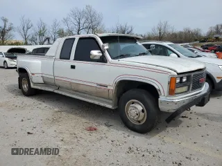 1989 GMC Sierra 1500 with VIN 2GTHC39K3K1532298, listed as a Copart auction lot 51497065 with 233,797 mi miles and Salvage Title. Bid and sale history available at DreamBid. Image 4.
