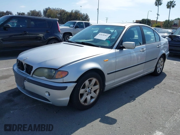 2002 BMW 3 Series 325i with VIN WBAET37492NG83135, listed as a IAAI auction lot 42028502 with 184,216 mi miles. Bid and sale history available at carsss.com. Image 2.