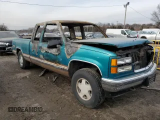 1995 GMC Sierra 1500 z VIN 2GTEK19K0S1570324, wystawiony jako Copart lot #43065205 z przebiegiem Nie podano mil oraz Szkody całkowita. Historia ofert i sprzedaży dostępna na DreamBid. Obrazek 4.