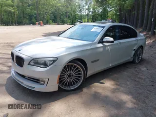 2013 BMW 7 Series 750Li with VIN WBAYE8C55DDS16013, listed as a IAAI auction lot 42709519 with 123,405 mi miles and . Bid and sale history available at DreamBid. Image 2.
