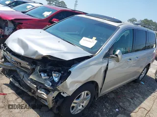 2007 Honda Odyssey EX-L z VIN 5FNRL38667B453060, wystawiony jako IAAI lot #42066637 z przebiegiem 184 439 mil mil oraz . Historia ofert i sprzedaży dostępna na DreamBid. Obrazek 2.
