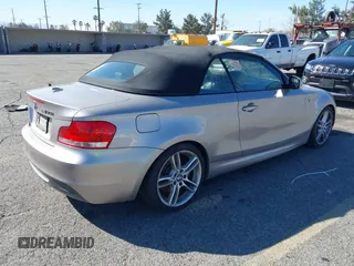 2012 BMW 1 Series 135i with VIN WBAUN7C53CVM26496, listed as a IAAI auction lot 41627261 with 104,568 mi miles and . Bid and sale history available at DreamBid. Image 4.