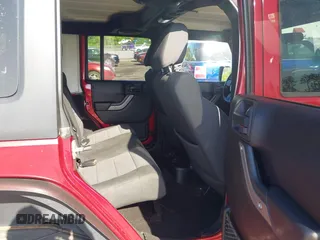 2011 Jeep Wrangler Unlimited Sport with VIN 1J4BA3H18BL598323, listed as a IAAI auction lot 41958043 with 154,354 mi miles. Bid and sale history available at carsss.com. Image 8.