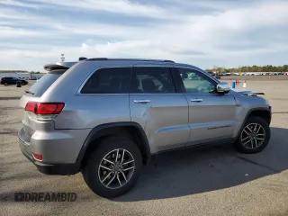 2021 Jeep Grand Cherokee 80th Anniversary with VIN 1C4RJFBG7MC665757, listed as a Copart auction lot 52443235 with 99,828 mi miles and Salvage Title. Bid and sale history available at DreamBid. Image 3.