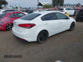 2017 Kia Forte LX with VIN 3KPFK4A71HE017819, listed as a IAAI auction lot 42086163 with 97,534 mi miles. Bid and sale history available at carsss.com. Image 4.